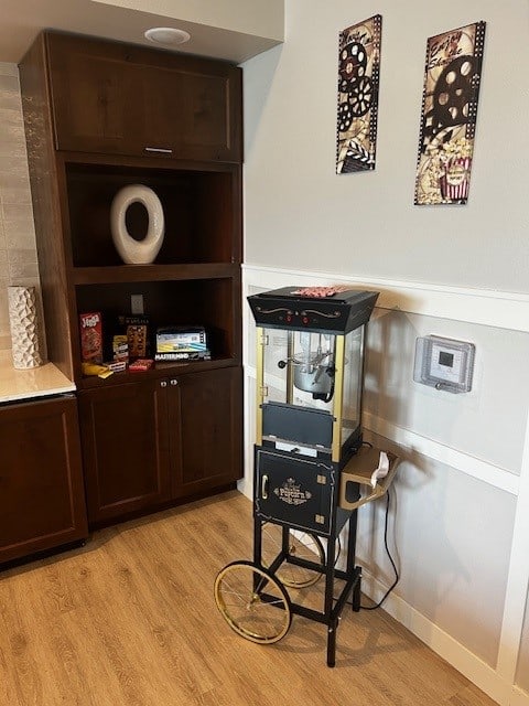 a room with a vending machine in the corner