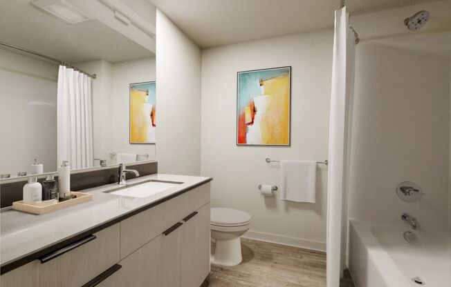 a bathroom with a toilet sink and bathtub at Marina Square, Bremerton, WA, 98337