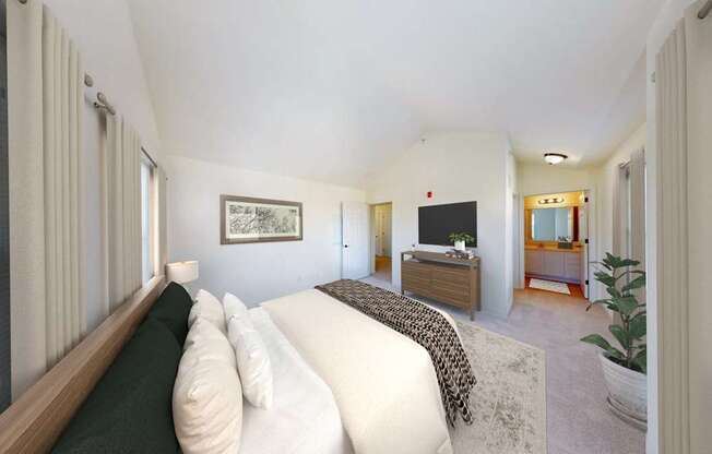 A bedroom with a bed, dresser, and mirror.