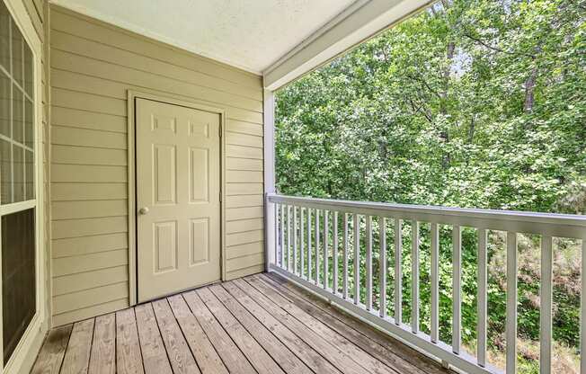 A balcony with a large closet storage