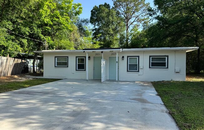 Just Renovated & Move-In Ready! 2BR/1BA Duplex on W 6th St – Pets Welcome!