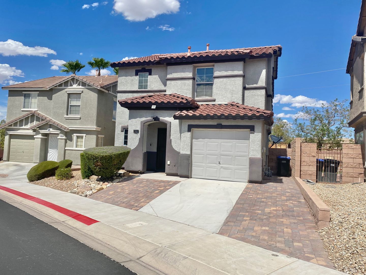 STUNNING 2 STORY HOME 3 BEDROOM 2.5 BATH W/ ONE CAR GARAGE IN A GATED COMMUNITY!