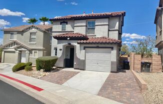 STUNNING 2 STORY HOME 3 BEDROOM 2.5 BATH W/ ONE CAR GARAGE IN A GATED COMMUNITY!