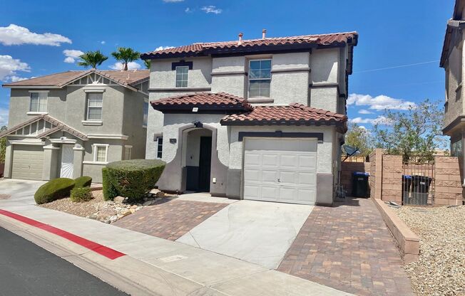 STUNNING 2 STORY HOME 3 BEDROOM 2.5 BATH W/ ONE CAR GARAGE IN A GATED COMMUNITY!