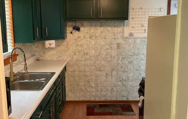 3 Bedroom 1.5 bath in Pitcairn – Wooded Views, Deck Life & Cozy Spaces. Finished Basement
