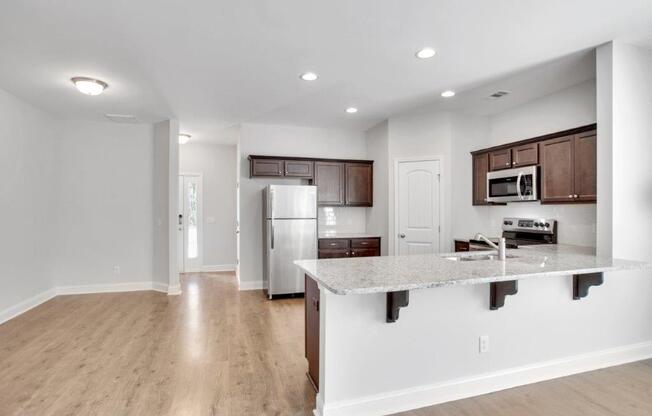 Harris Trail Luxury Townhomes for rent Richmond Hill, GA photo of kitchen with stainless steel appliances