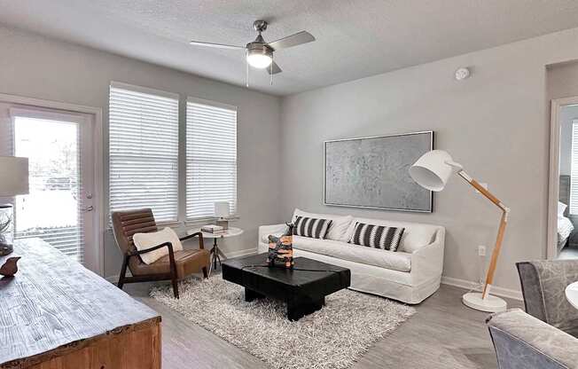 Open-concept living areas with hardwood-inspired flooring