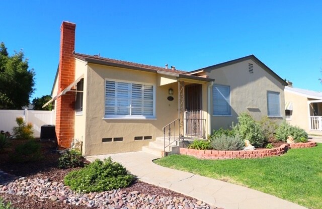 Beautiful 2 Bedroom, 1 Bath Talmadge Home with Hardwood Floors - Great Curb Appeal!