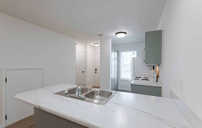 Kitchen with newly painted cabinets