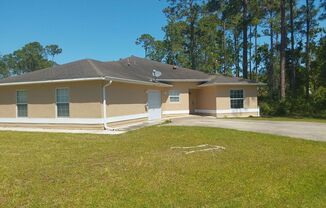 Great 3/2/1 duplex with a private driveway and entrance!  Partially fenced yard! Must see!