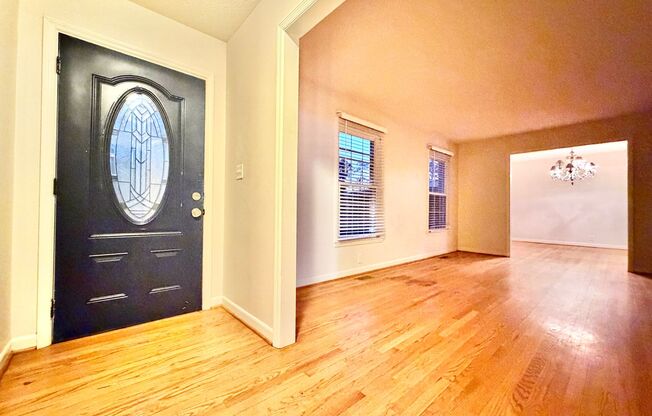 Charming Ranch with Fireplace, Two Living Areas & Large Lot – Minutes to Downtown