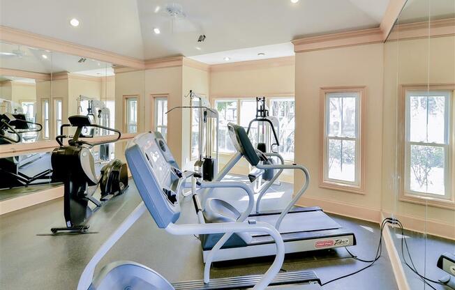 Cardio and weight training in fitness center at Saxony at Chase Oaks in North Plano, TX, For Rent. Now leasing 1, 2 and 3 bedroom apartments.