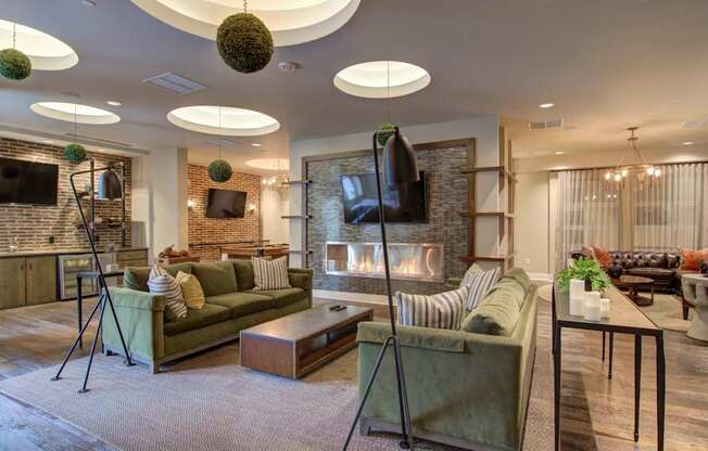 A living room with a fireplace and a couch.