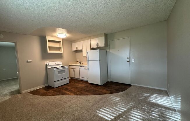 Includes Free Covered and Gated Parking Space!  $1,000 Moves You in Today!