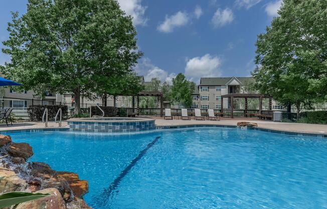 a pool next to a body of water