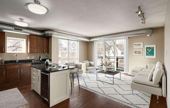 a kitchen and living room in a 555 waverly unit