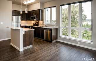 Well-lit kitchen at LaScala Apartments in Beaverton, Oregon