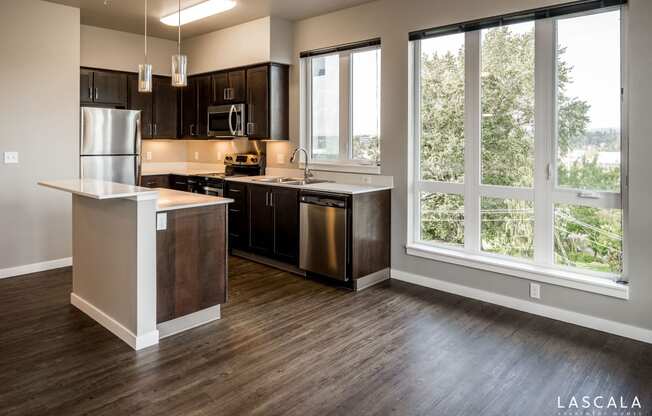 Well-lit kitchen at LaScala Apartments in Beaverton, Oregon