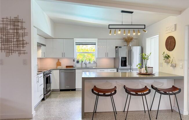 AVAILABLE NOW! Mid-Century Modern 3/2 with POOL!