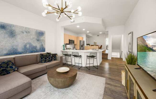 a living room with a couch and a table