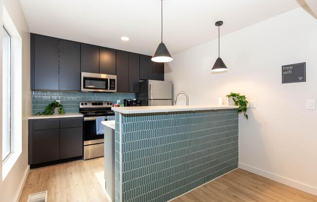 a kitchen with a tile floor