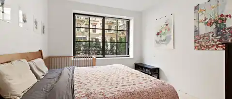 310 W 113 ST