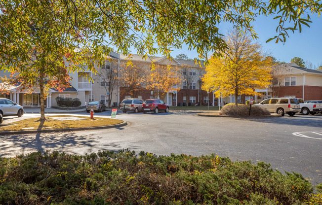 a parking lot at the whispering winds apartments in pearland, tx