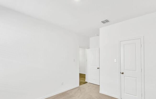 This single-story home has a smart layout that is perfect for growing families.