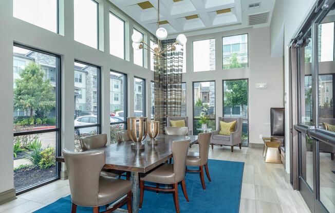 a room filled with furniture and a large window