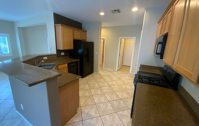 CLOSE TO N.A.F.B. GREAT FAMILY  HOME IN SUNRISE CANYON SUBDIVISION!