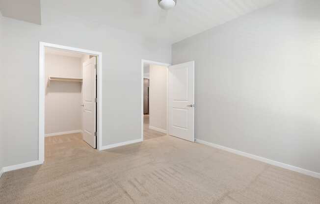 Spacious Carpeted Rooms With Walk-In Closets AtUnion at Roosevelt Apartments In Phoenix, AZ
