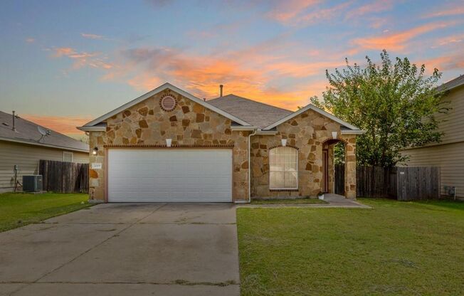 Open Floorpan is Move in Ready just for you! Wood look laminate and Tile run throughout the home with carpet only in the bedrooms.