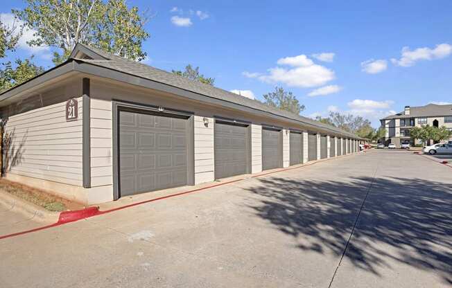 a row of garages in front of a house