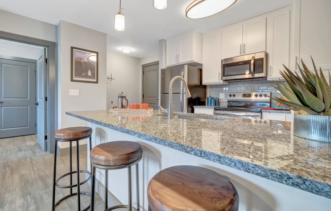 Kitchen with White Shaker Cabinetsat Latitude at South Portland Apartment, Maine, 04106