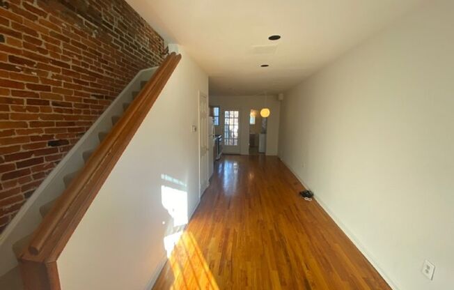 A charming two bedroom one and one half  bath row house located just off New Jersey Ave in the Shaw Neighborhood!