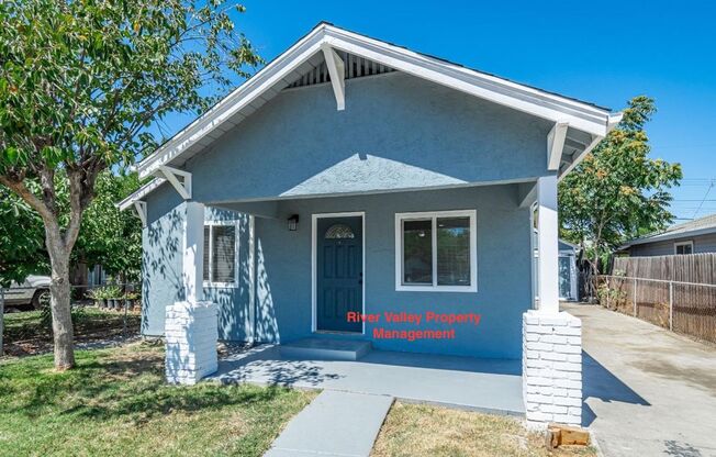 Available Now! Adorable remodeled Cottage, 3+2, CHA, Garage, fenced yard, close to Christian Brothers High School