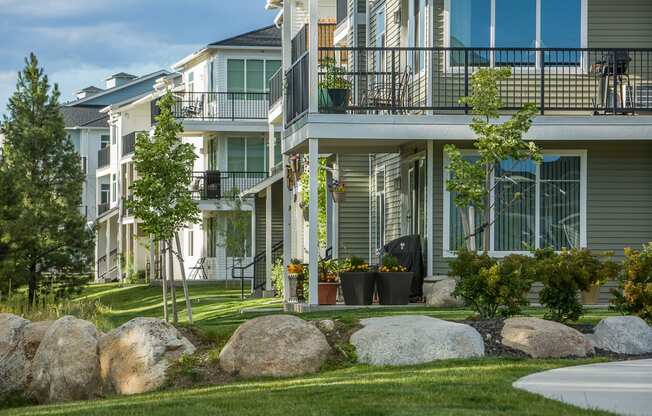 River House Apartments Building Exterior and Green Grass