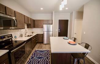 Kitchen at Confluence on 3rd Apartments in Downtown Des Moines