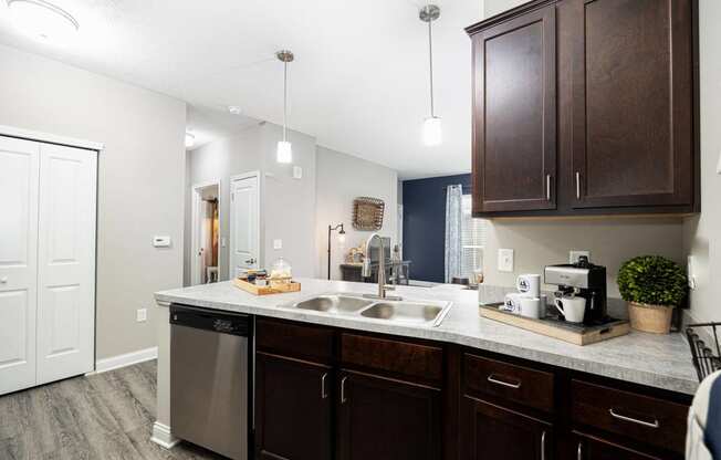 spacious kitchen with stainless steel appliances at the district flats apartments in lenexa