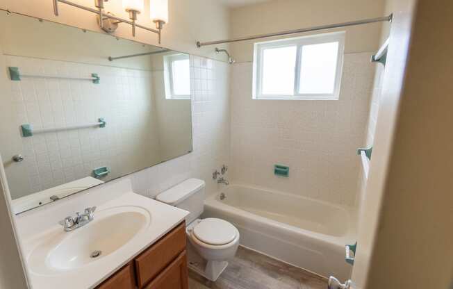 This is a photo of the bathroom in the 1004 square foot, 2 bedroom, 1.5 bath townhome floor plan at Lake of the Woods Apartments in Cincinnati, OH.
