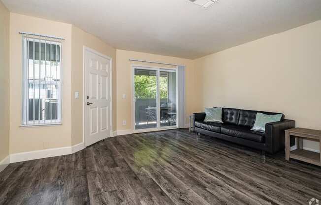 a living room with a couch and a table