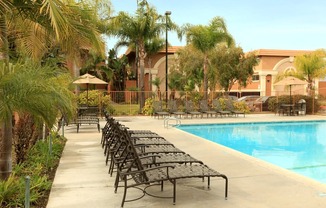 Ocean Breeze Villas Pool with Lounge Chairs