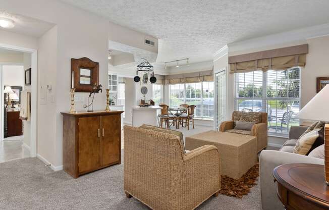 a living room with furniture and a table