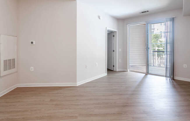 Living Room with Balcony and Hard Surface Flooring