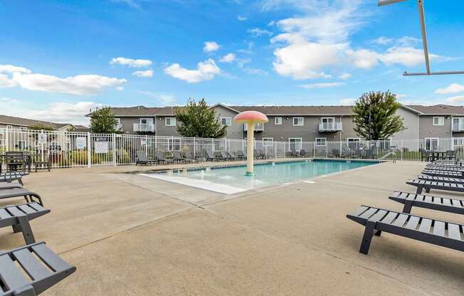 A sunny day at the pool of a residential complex.