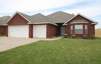 Spacious Home in Mustang with 3 Car Garage!