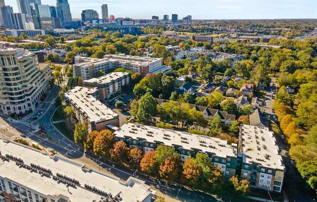 Flatiron West Trade Apartments aerial view with Charlotte skyline in background