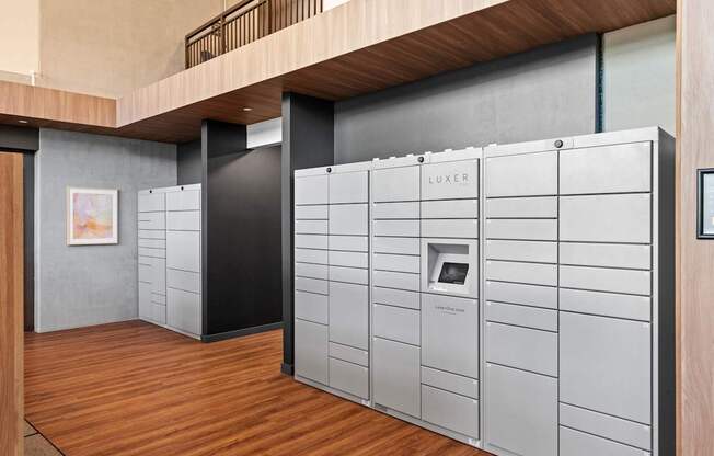 A modern room with a LUXER sign on the wall.