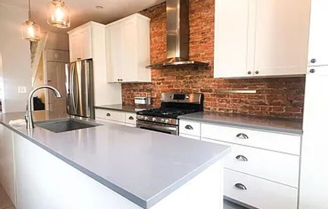Bright updated 2 bed 1 bath (with heated floors) and private outdoor space!