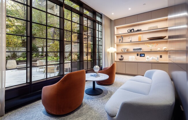 Step into comfort and style at Anagram Turtle Bay, where modern design meets cozy living. This inviting lounge area features expansive windows, stylish furnishings, and a serene ambiance. Explore your new home today!
